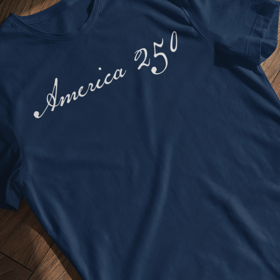 America 250 t-shirt in true navy with elegant script lettering on soft 100% cotton blank, patriotic revolutionary-era design