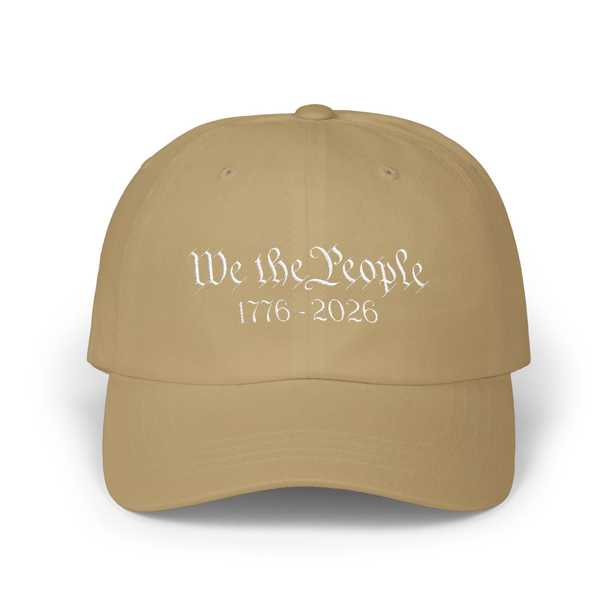 Khaki colored cap with embroidered 'We the People 1776-2026' against a white background