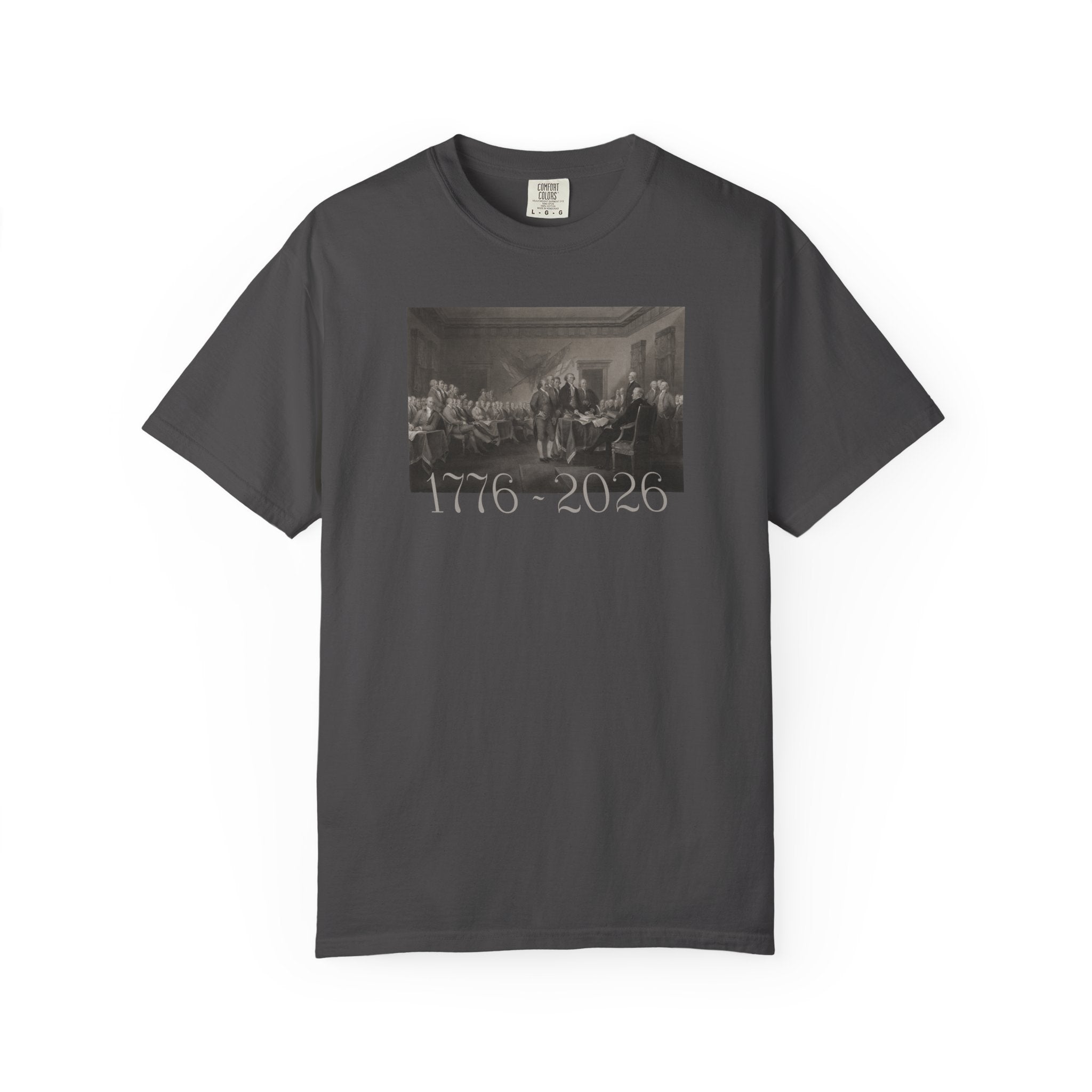 Graphite Comfort Colors t-shirt with a printed design of Trumbull's  'Declaration of Independence' painting with '1776-2026' in overlapping revolutionary era text