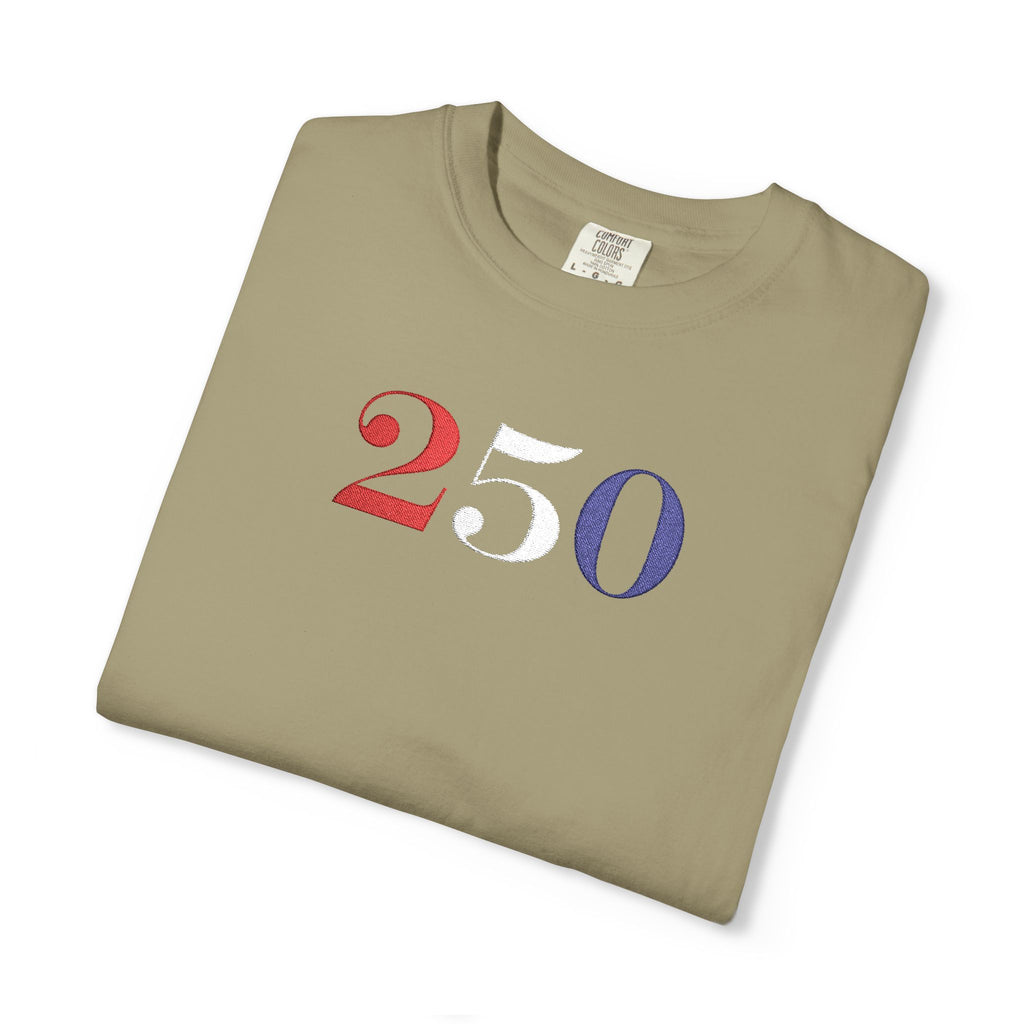 Folded khaki-colored t-shirt with '250' embroidered in red, white, and blue