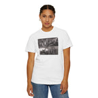 Woman wearing a White Comfort Colors t-shirt printed with a montage of four revolutionary war era paintings