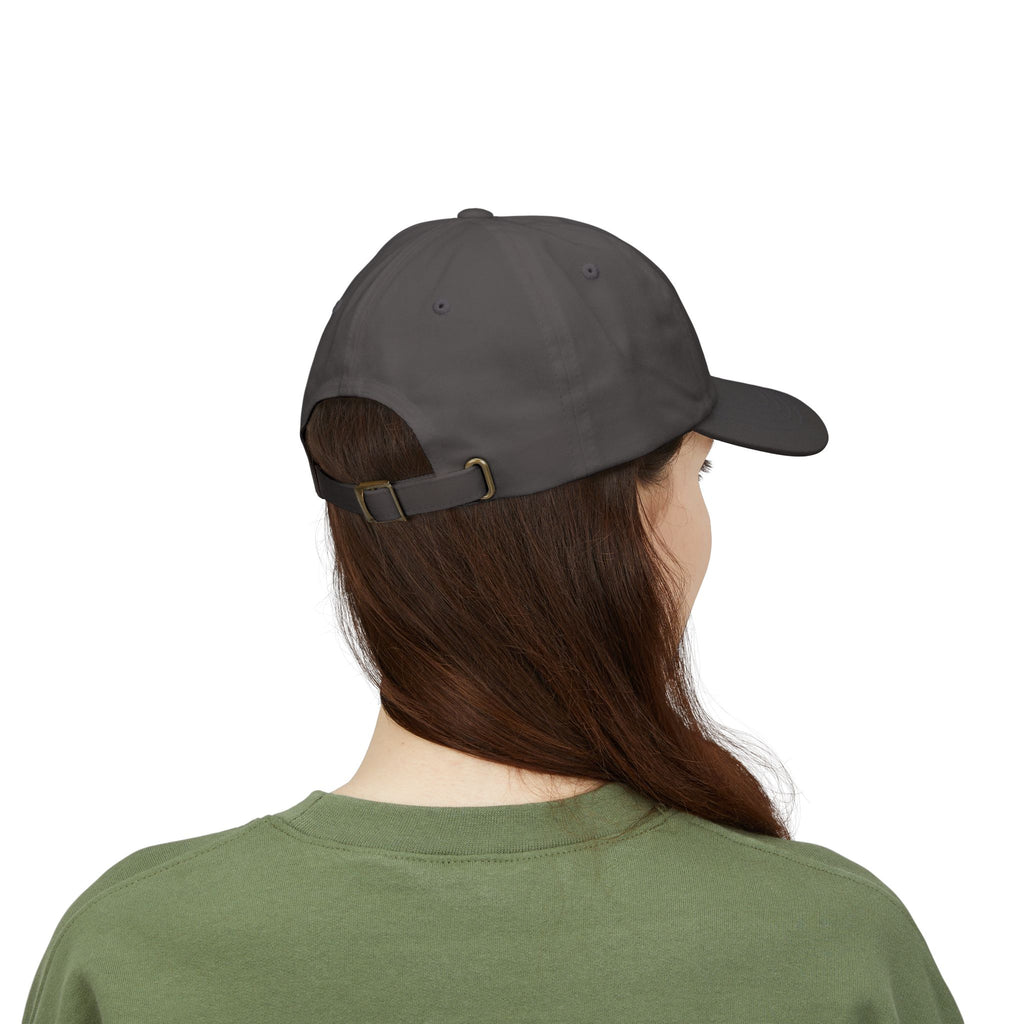 Back view of woman wearing a Dark Grey dad cap embroidered with '1776'