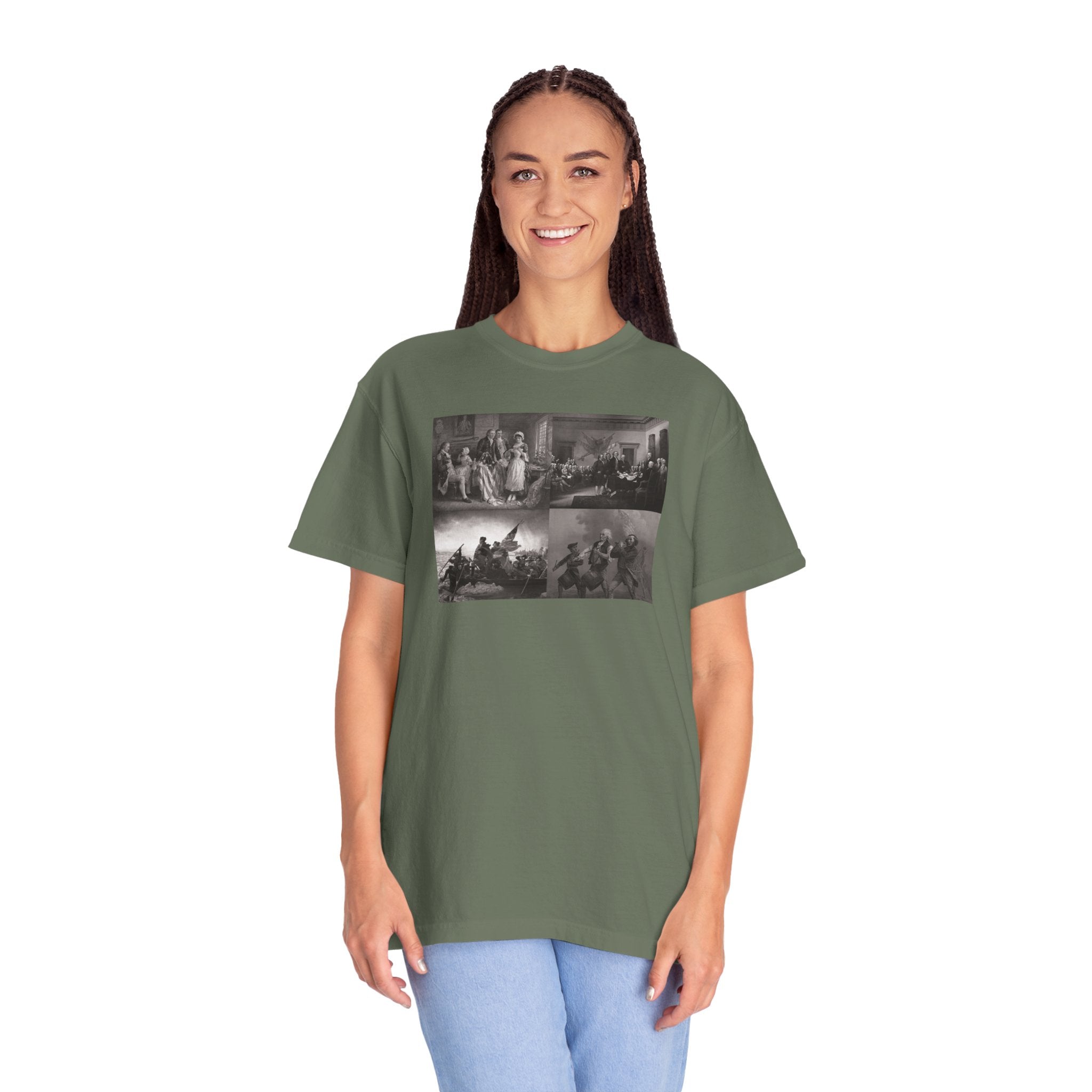 Woman wearing an oversized Moss Comfort Colors t-shirt printed with a montage of four revolutionary war era paintings