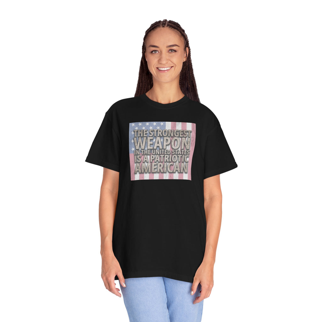woman wearing oversized 'The Strongest Weapon in the United States is a Patriotic American' t-shirt in black