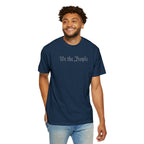Smiling man wearing 'We the People' embroidered t-shirt in true navy