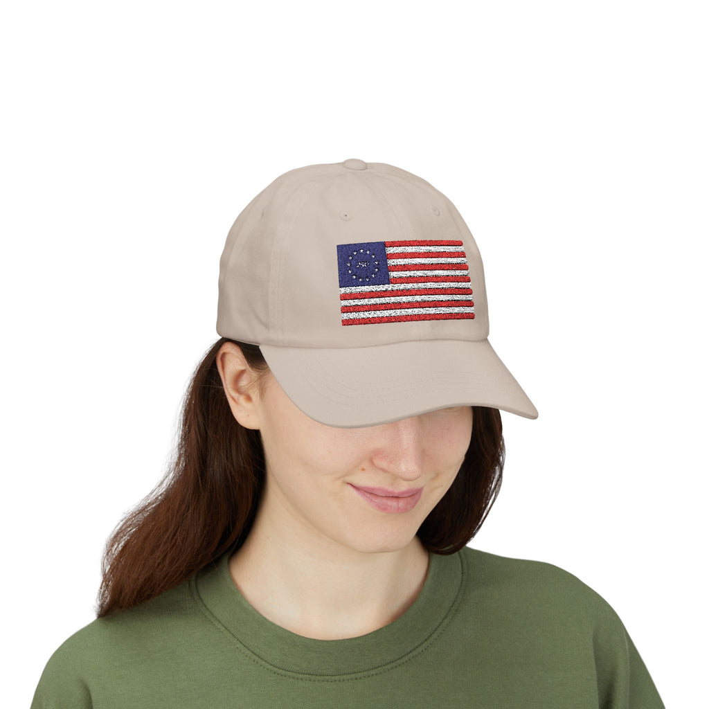 Woman wearing stone dad cap embroidered with Betsy Ross Flag