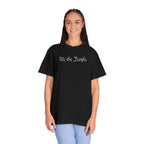 Smiling woman wearing oversized 'We the People' embroidered t-shirt in black