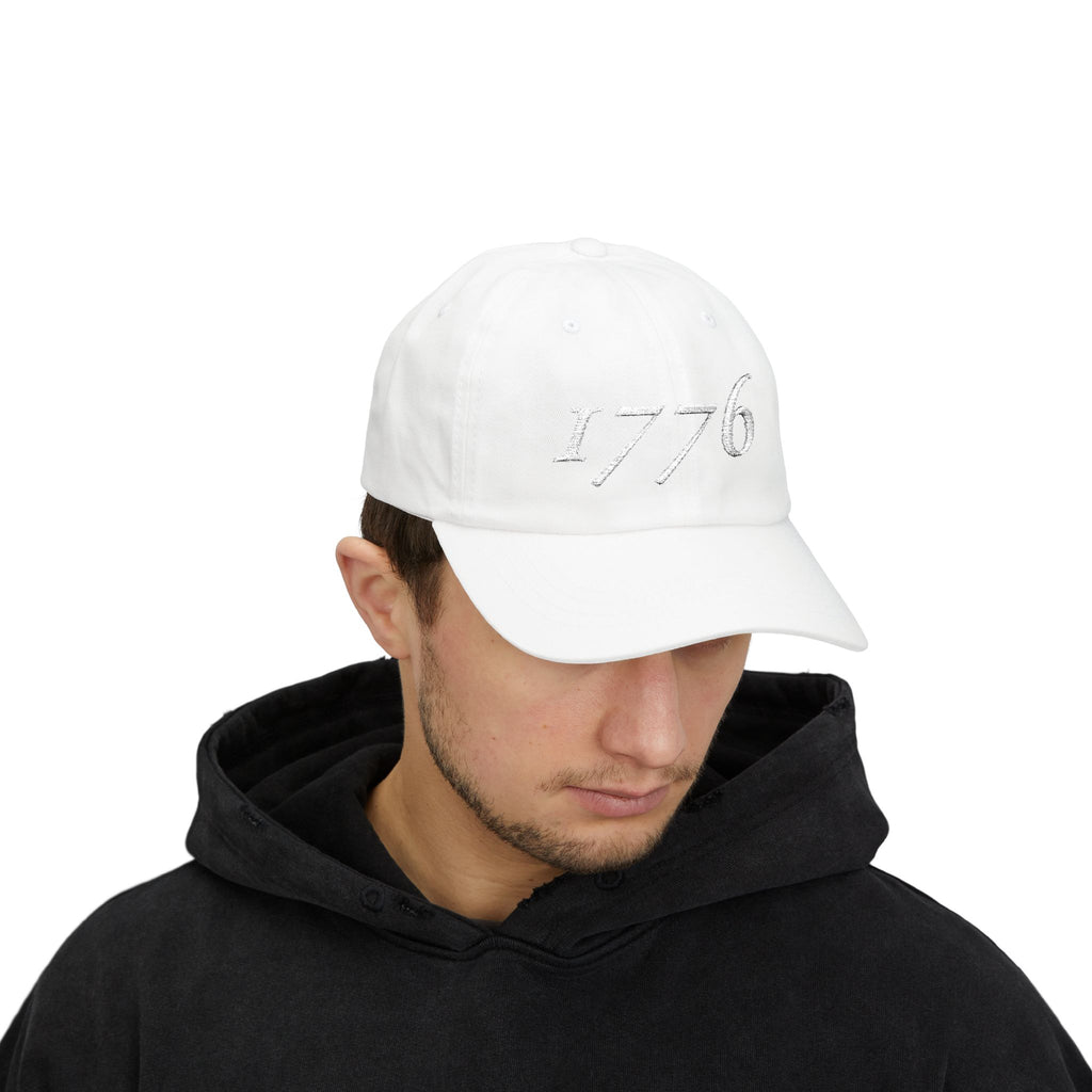 Man wearing a '1776' embroidered dad cap in White