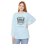 Woman wearing a Chambray 
long sleeve United We Stand eagle t-shirt