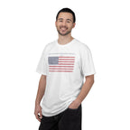Smiling man wearing a White Comfort Colors t-shirt with distressed American flag graphic and 'They Walked Into the Wrong Republic' quote from Entheos