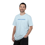 Smiling man wearing a Chambray Comfort Colors t-shirt with 'GOD IS GOOD' embroidered in cornflower blue thread