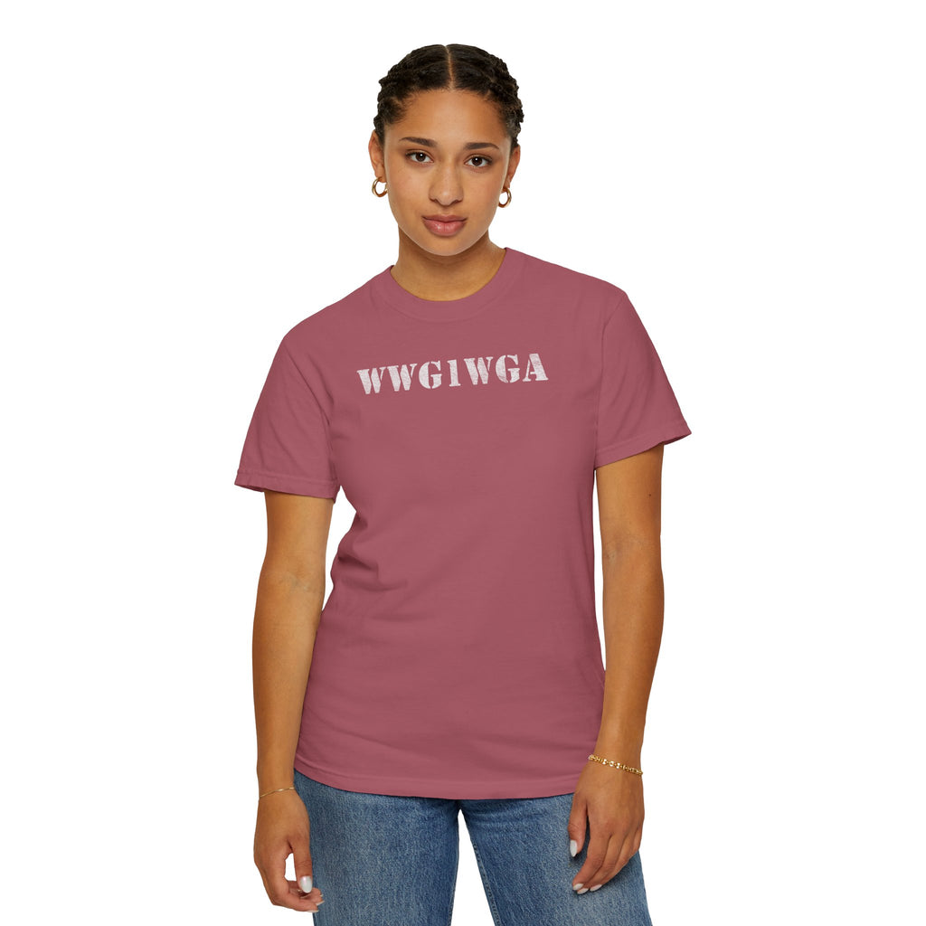 Woman wearing 'WWG1WGA' stenciled t-shirt in crimson