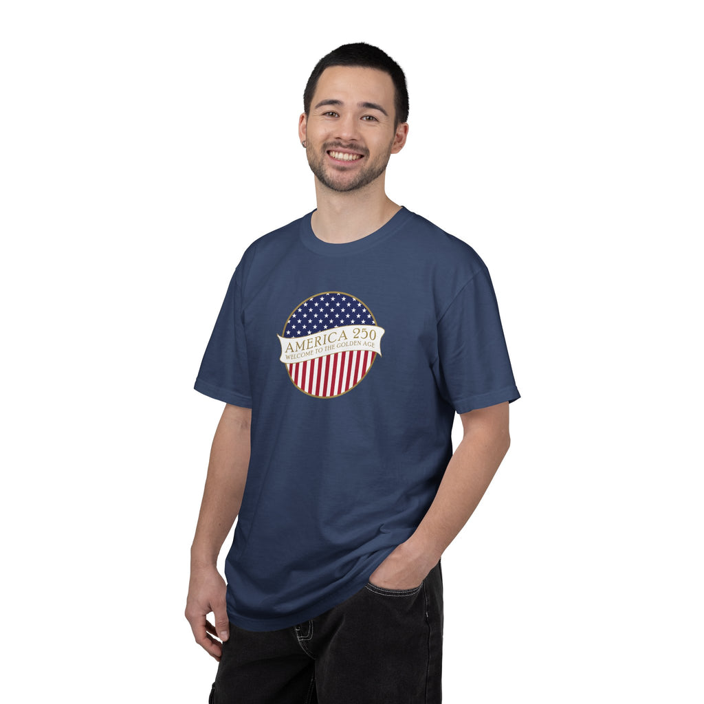 Man wearing a China Blue Comfort Colors t-shirt with an America 250 design with text 'America 250 Welcome to the Golden Age'