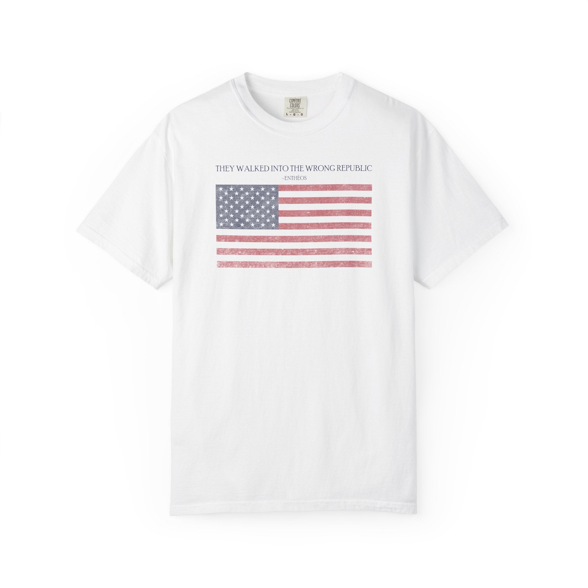 White Comfort Colors t-shirt with distressed American flag graphic and 'They Walked Into the Wrong Republic' quote from Entheos