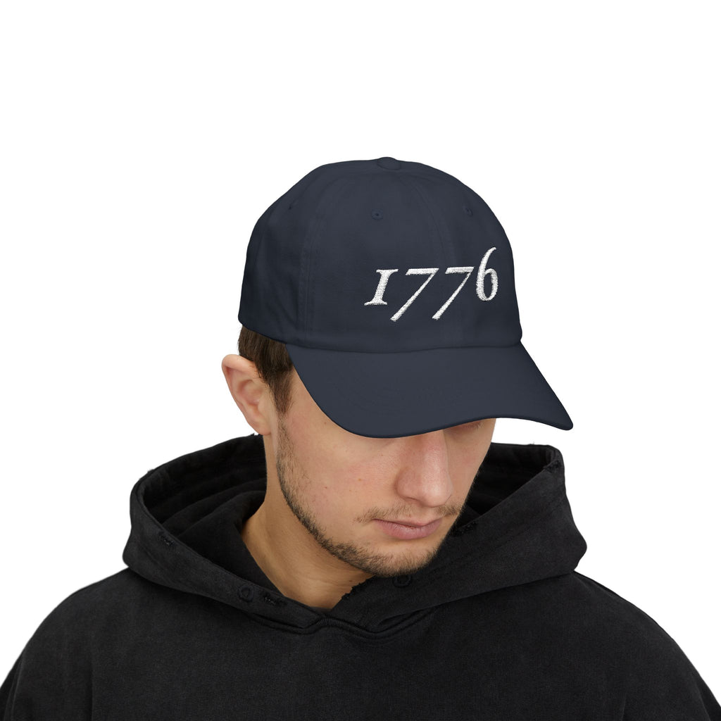 Man wearing a '1776' embroidered dad cap in Navy