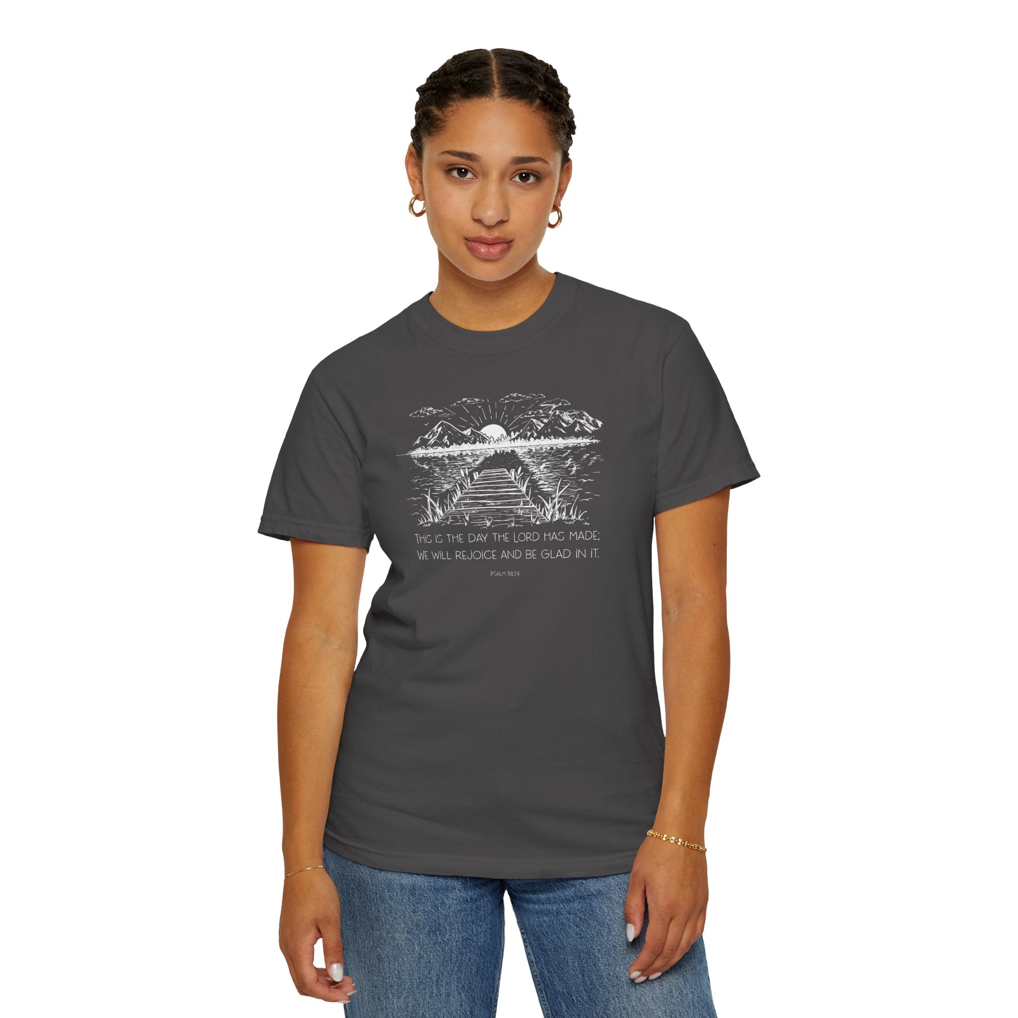 Woman wearing Graphite Comfort Colors t-shirt with nature graphic and 'This is the day the Lord has made; We will rejoice and be glad in it' below