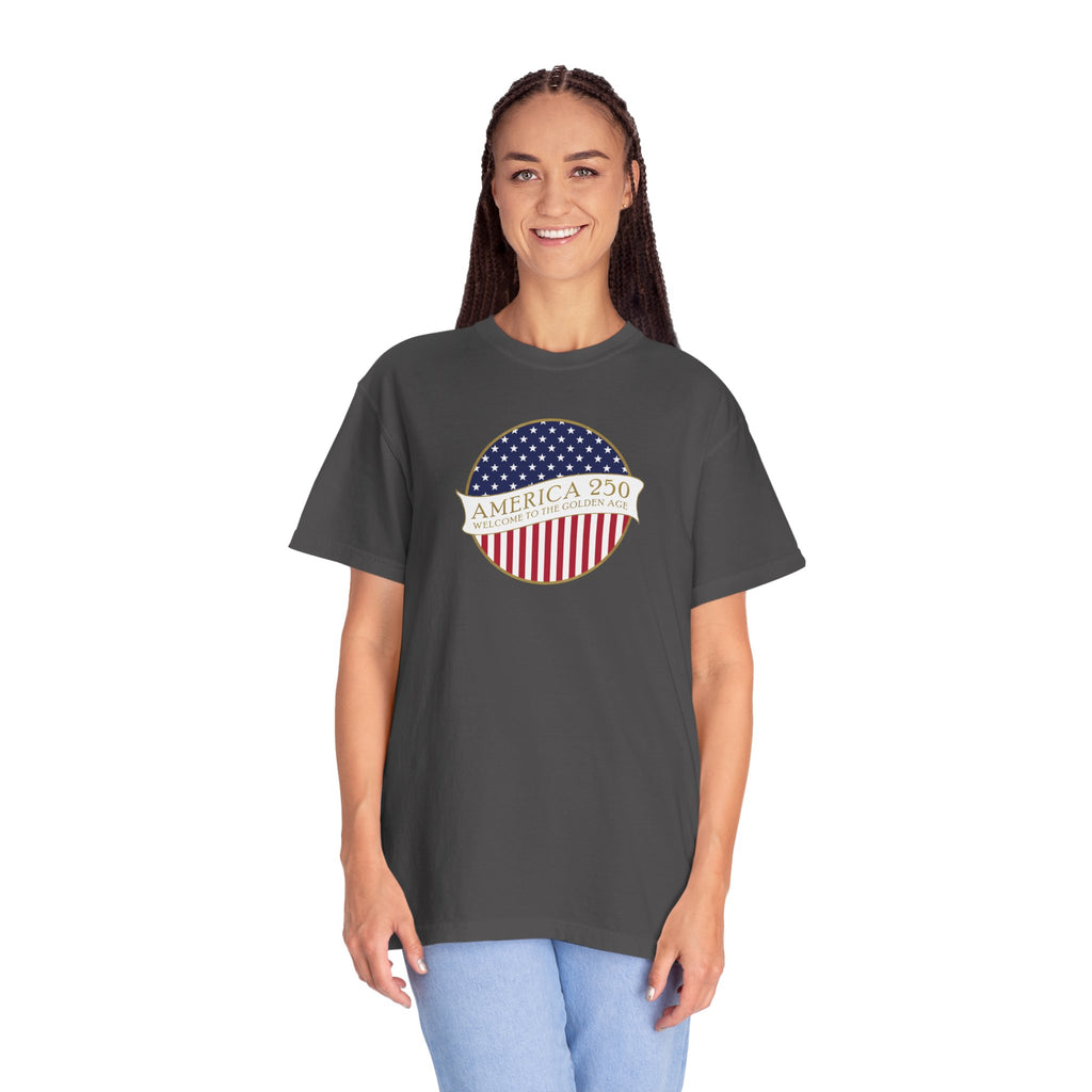 Smiling woman wearing an oversized Graphite Comfort Colors t-shirt with an America 250 design with text 'America 250 Welcome to the Golden Age'