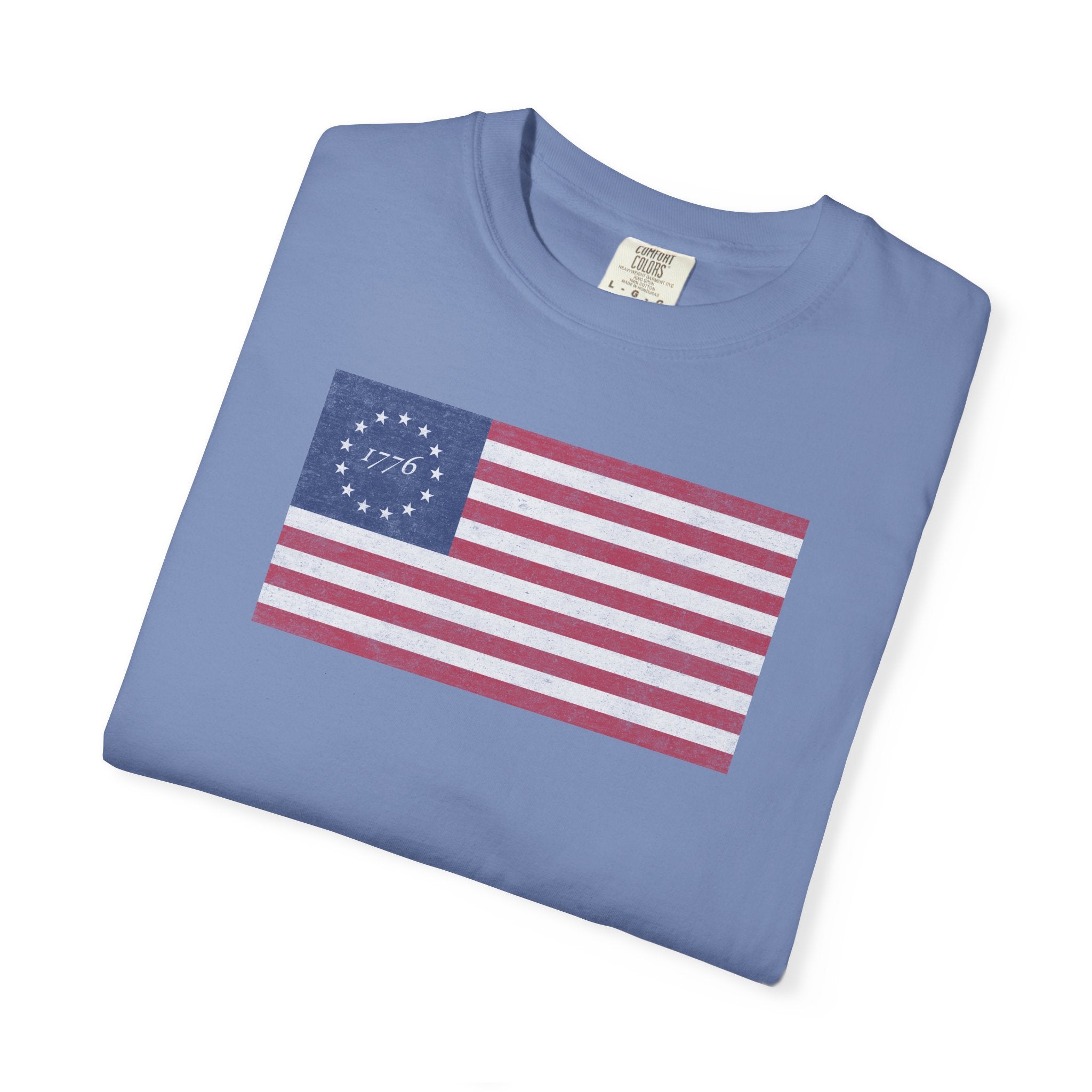 Folded distressed Betsy Ross flag 1776 t-shirt in washed denim