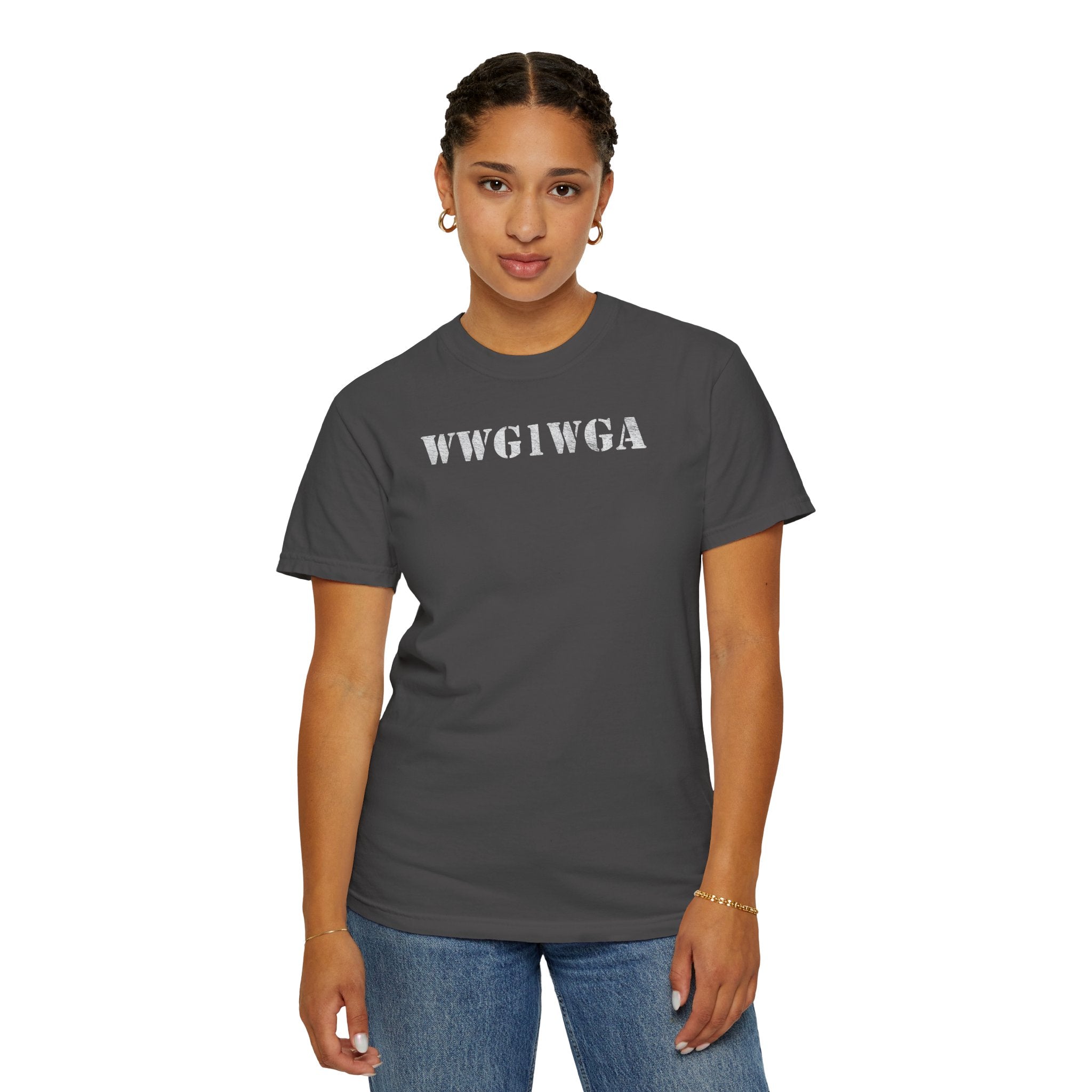 Woman wearing 'WWG1WGA' stenciled t-shirt in graphite