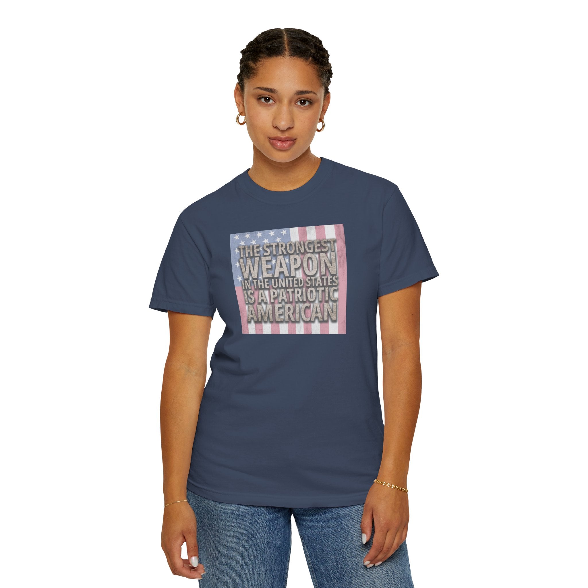 woman wearing 'The Strongest Weapon in the United States is a Patriotic American' t-shirt in midnight