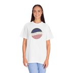 Smiling woman wearing an oversized White Comfort Colors t-shirt with an America 250 design with text 'America 250 Welcome to the Golden Age'