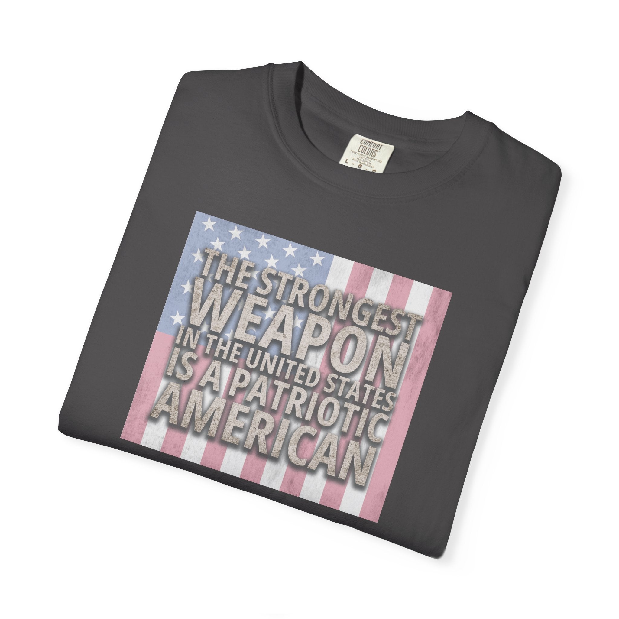 Folded 'The Strongest Weapon in the United States is a Patriotic American' t-shirt in graphite