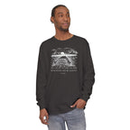 Man wearing a long-sleeve Graphite Comfort Colors t-shirt featuring Psalm 118:24 paired with a nature graphic 