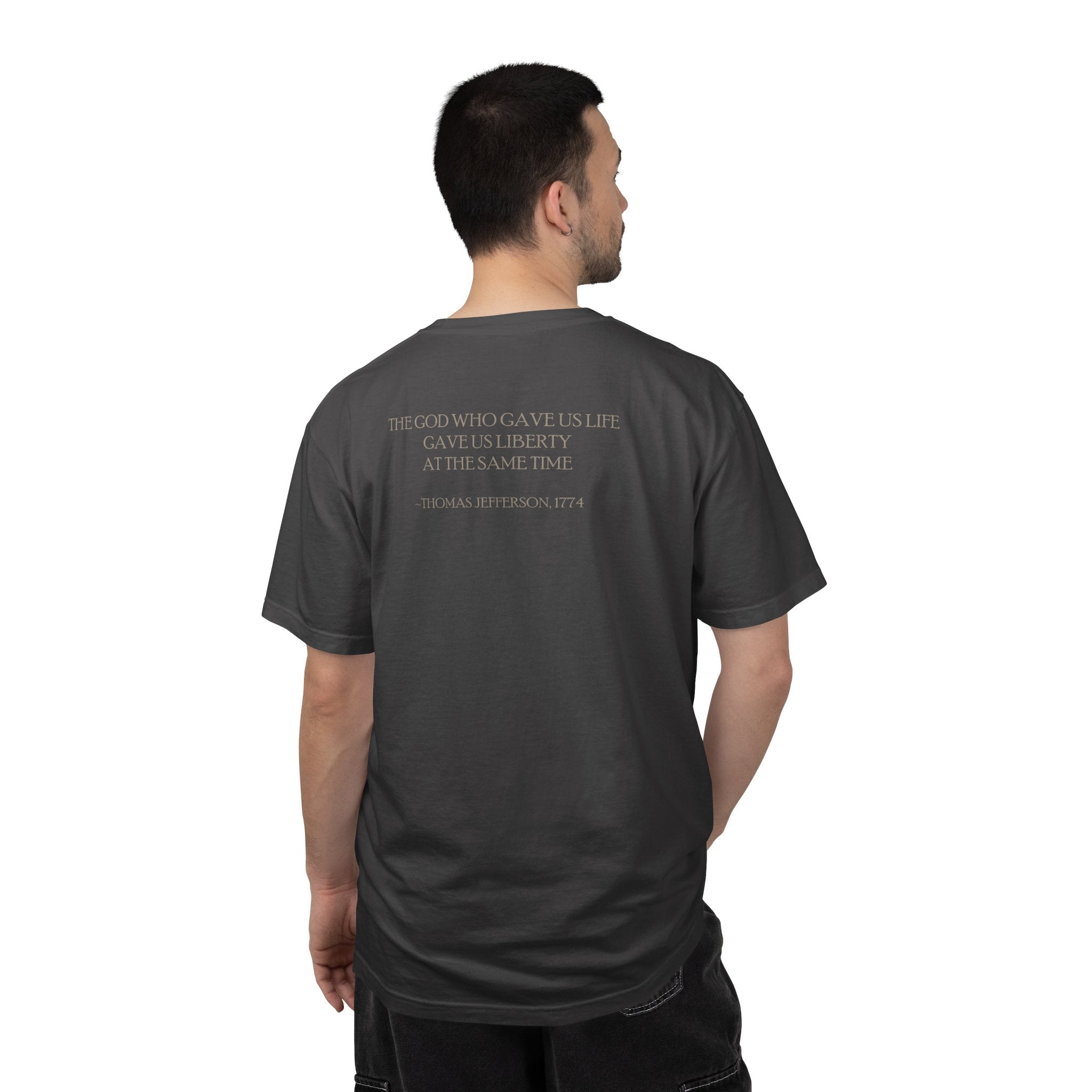 Back view of man wearing Thomas Jefferson tee with 'God Gave Us Life Gave Us Liberty' quote, graphite