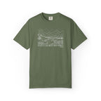 Sage t-shirt with mountain river design and Bible verse from Micah 6:8 against a white background
