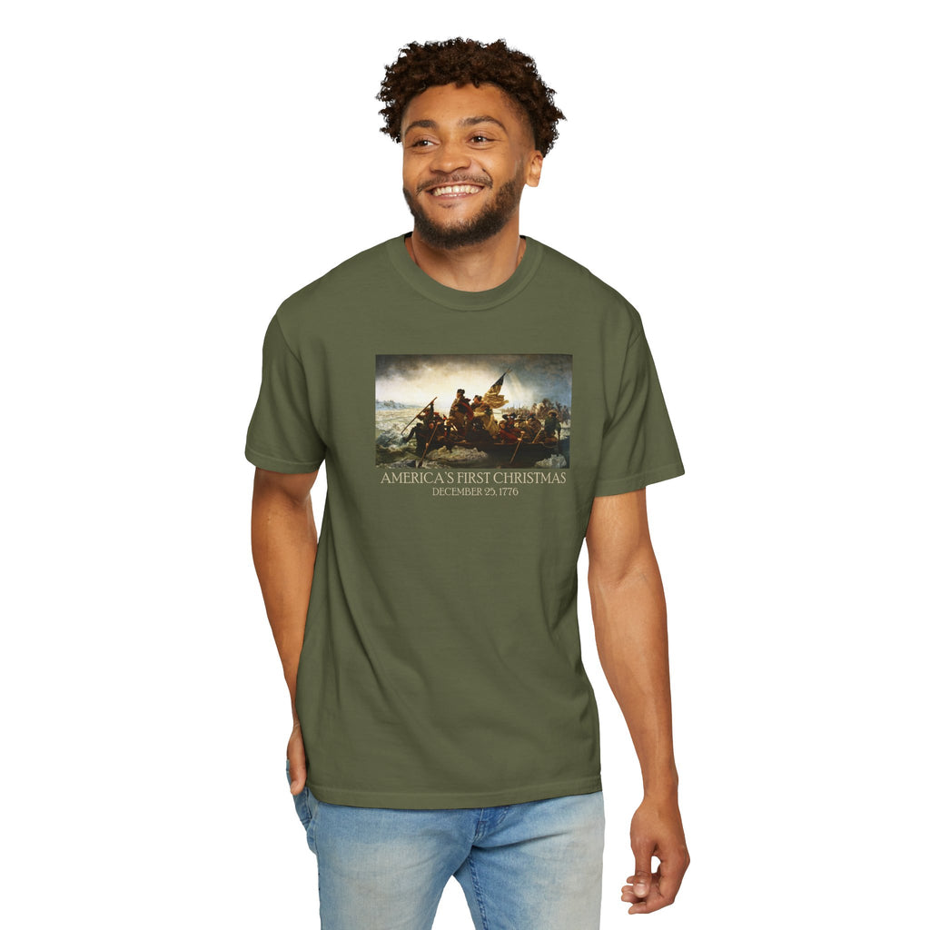 Smiling Man wearing a Hemp Comfort Colors t-shirt with print of Emanuel Leutze’s 'Washington Crossing the Delaware' with 'America's First Christmas December 25, 1776' printed below 