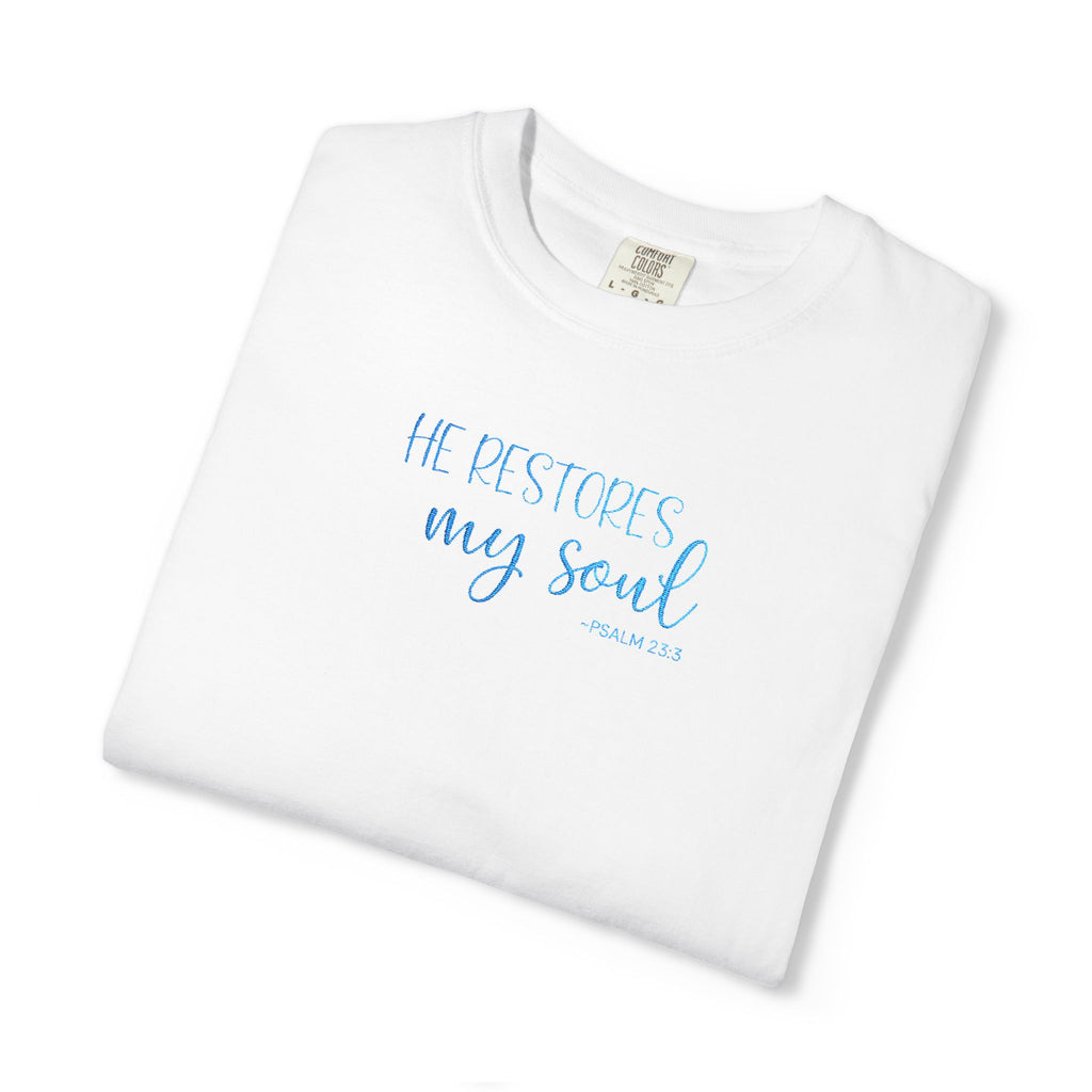 white 'He Restores My Soul' t-shirt embroidered with cornflower blue thread, Psalm 23:3 design, folded