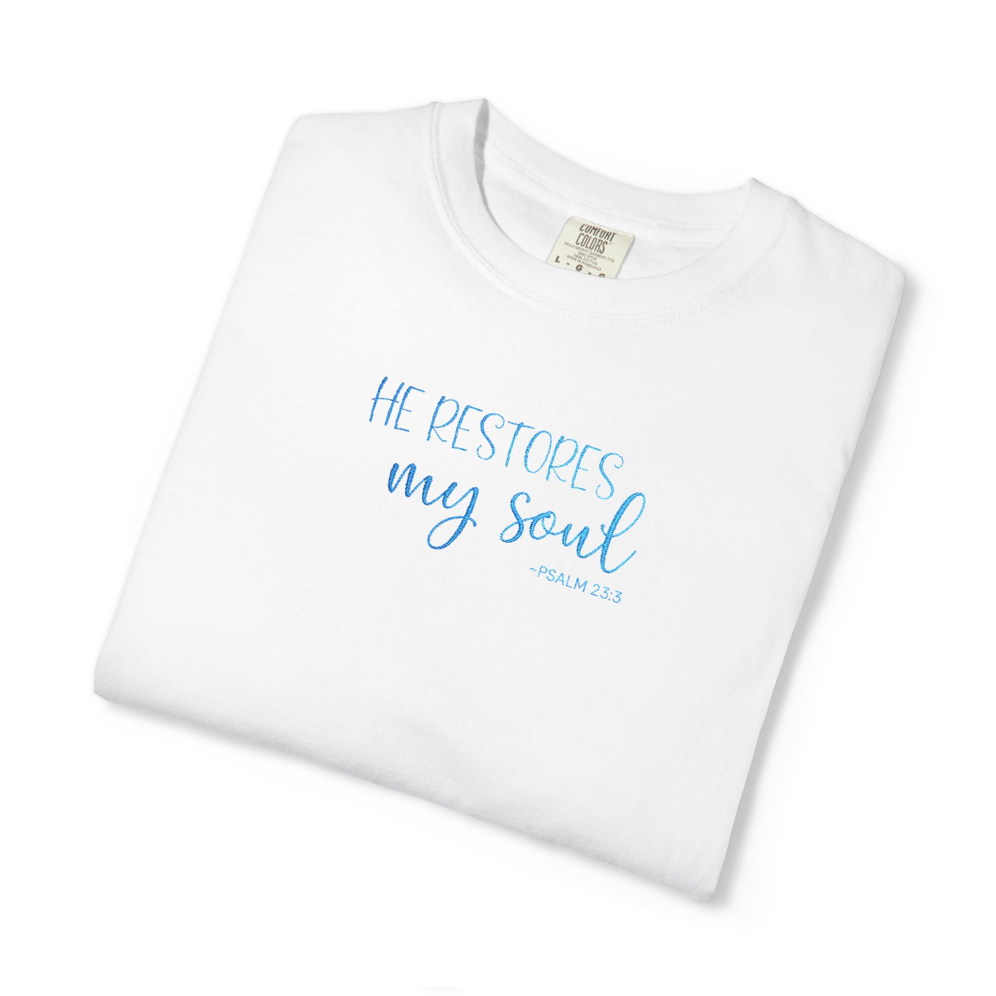 white 'He Restores My Soul' t-shirt embroidered with cornflower blue thread, Psalm 23:3 design, folded