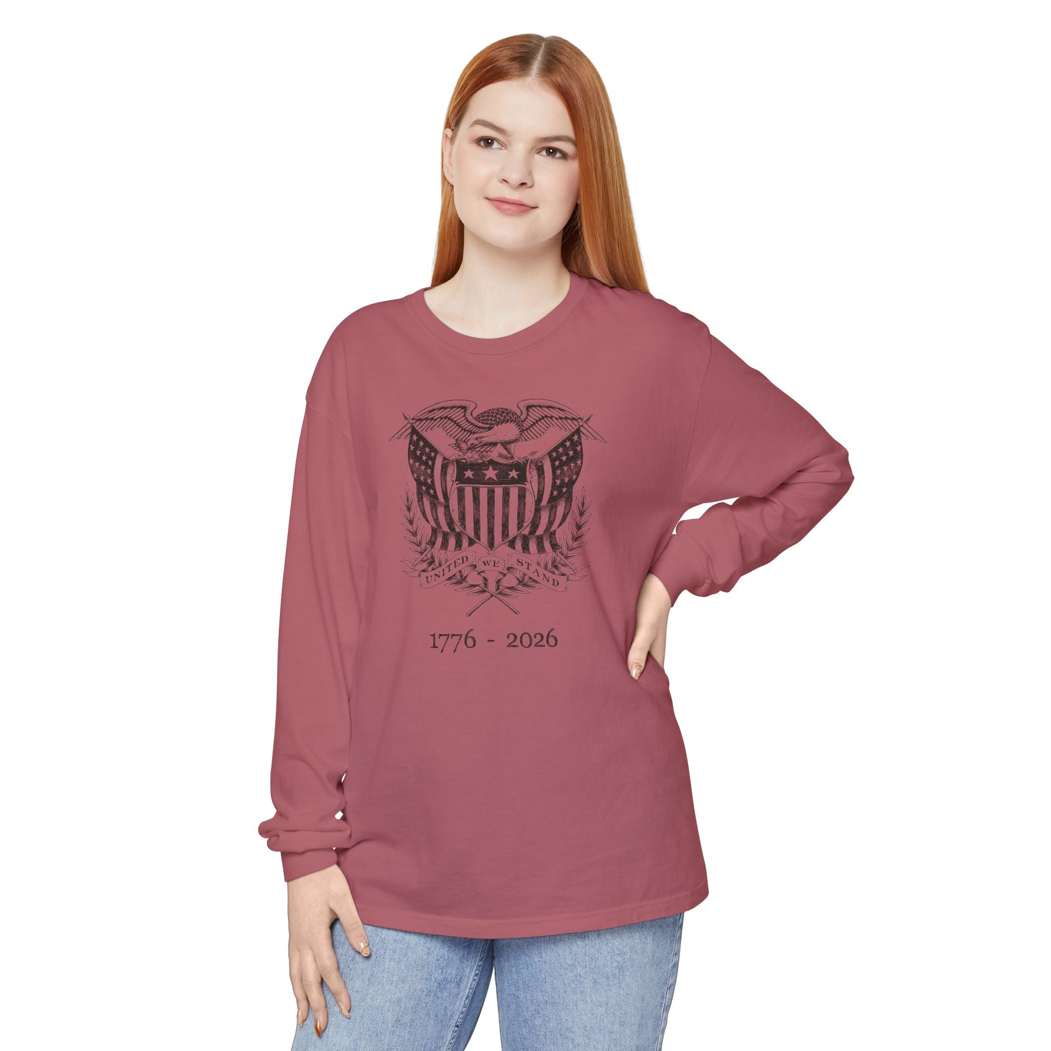 Woman wearing a Crimson long sleeve United We Stand eagle t-shirt