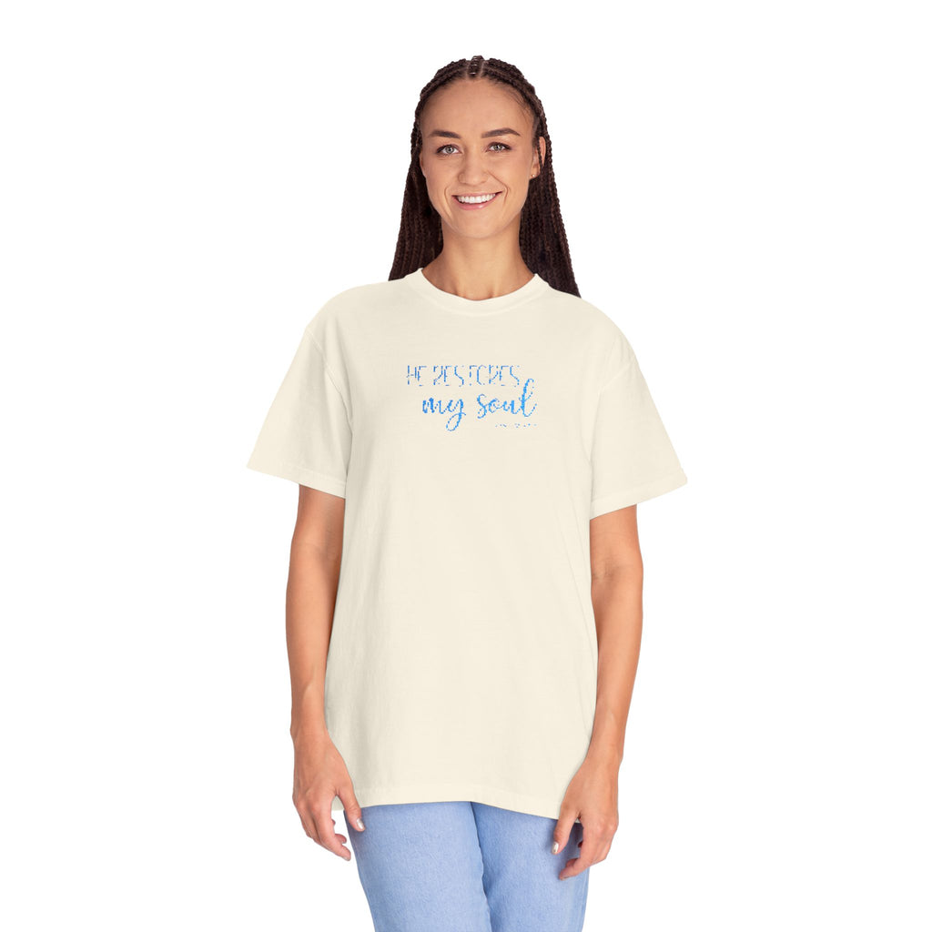 Smiling woman wearing an oversized Ivory Comfort Colors t-shirt with 'He restores my soul' embroidered in cornflower blue thread