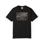 Black Comfort Colors t-shirt with a printed design of Trumbull's  'Declaration of Independence' painting with '1776-2026' in overlapping revolutionary era text