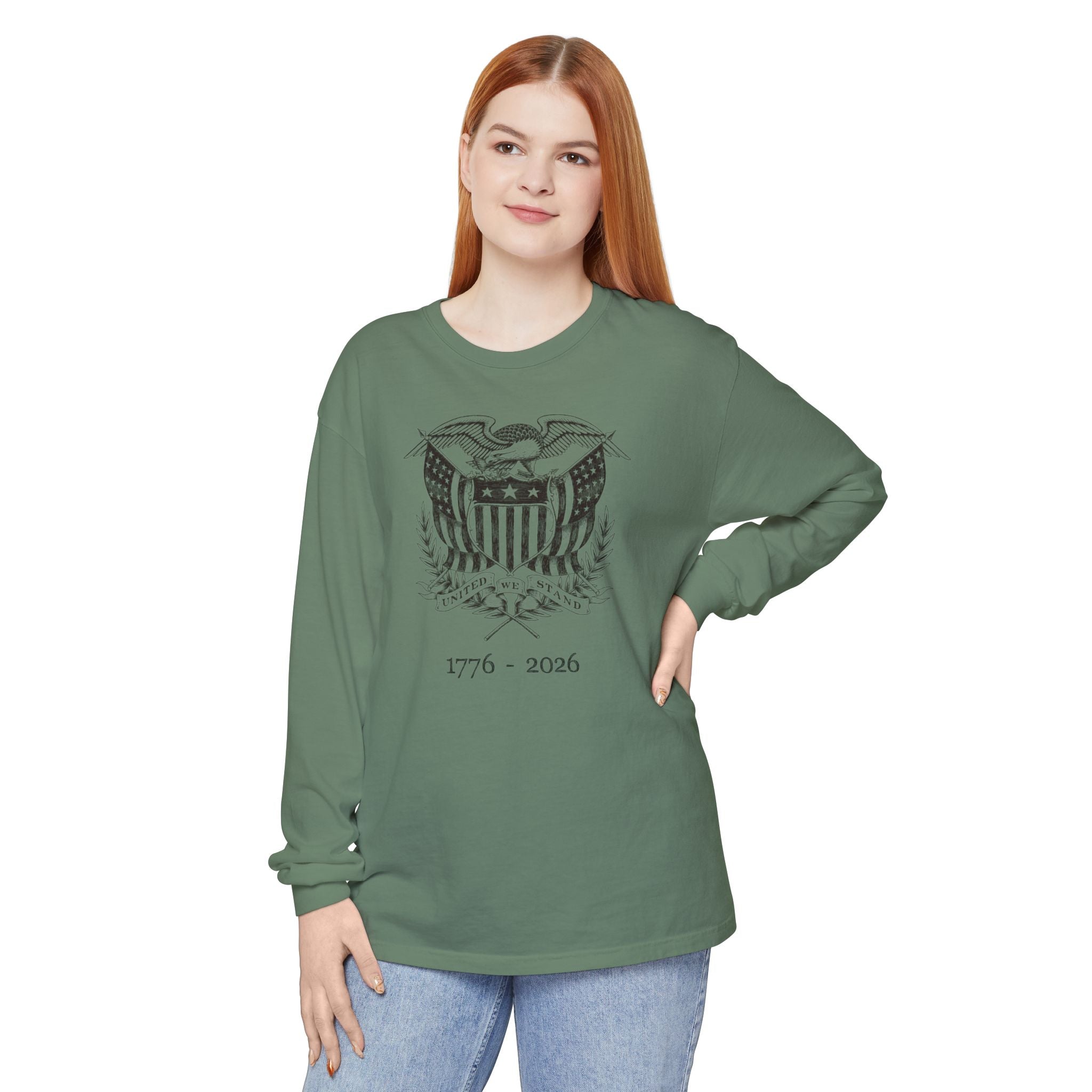 Woman wearing a Light Green long sleeve United We Stand eagle t-shirt