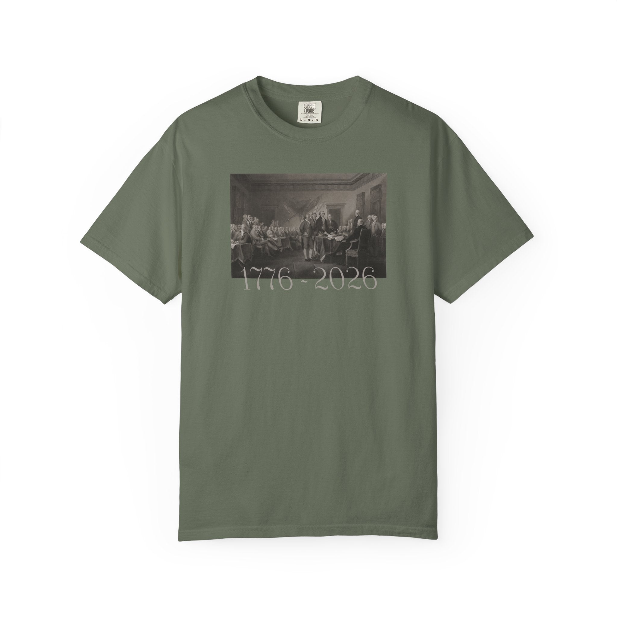 Moss Comfort Colors t-shirt with a printed design of Trumbull's  'Declaration of Independence' painting with '1776-2026' in overlapping revolutionary era text