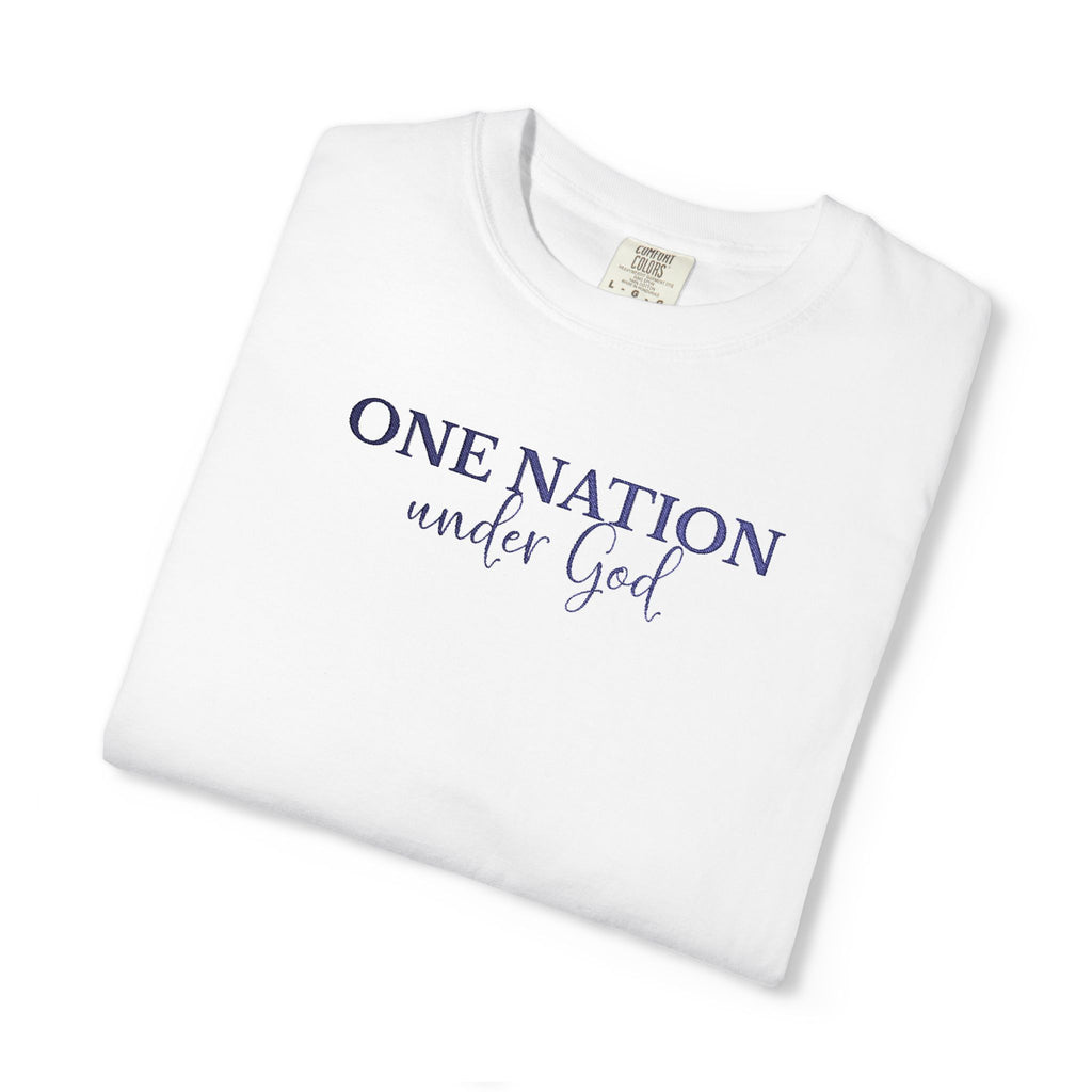 Folded White Comfort Colors t-shirt with 'One Nation under God' embroidered with blue thread