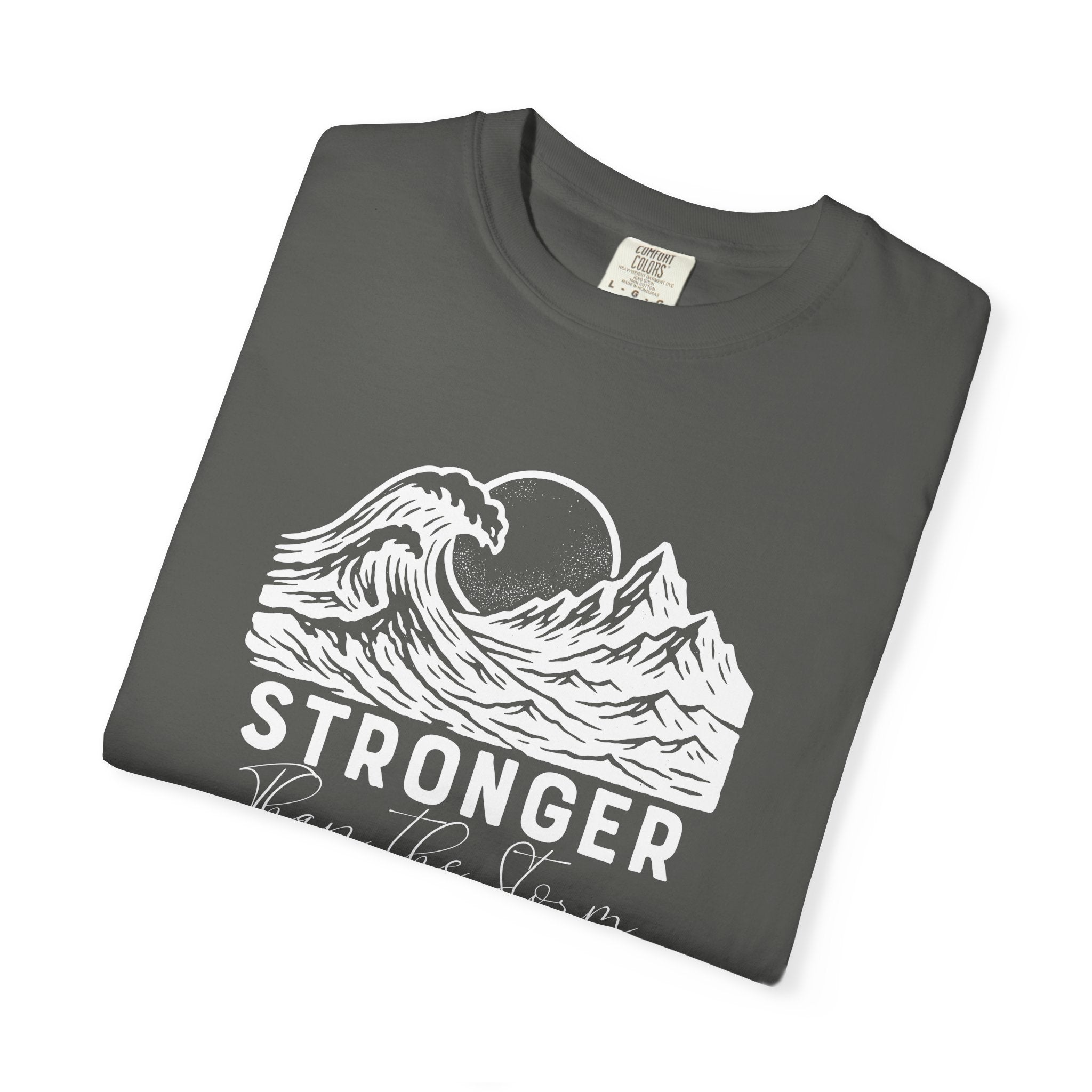Folded Stronger Than The Storm Christian t-shirt in pepper with a mountain wave sun design