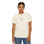 Woman wearing an Ivory Comfort Colors t-shirt with embroidered "Blessed are the Peacemakers" + dove