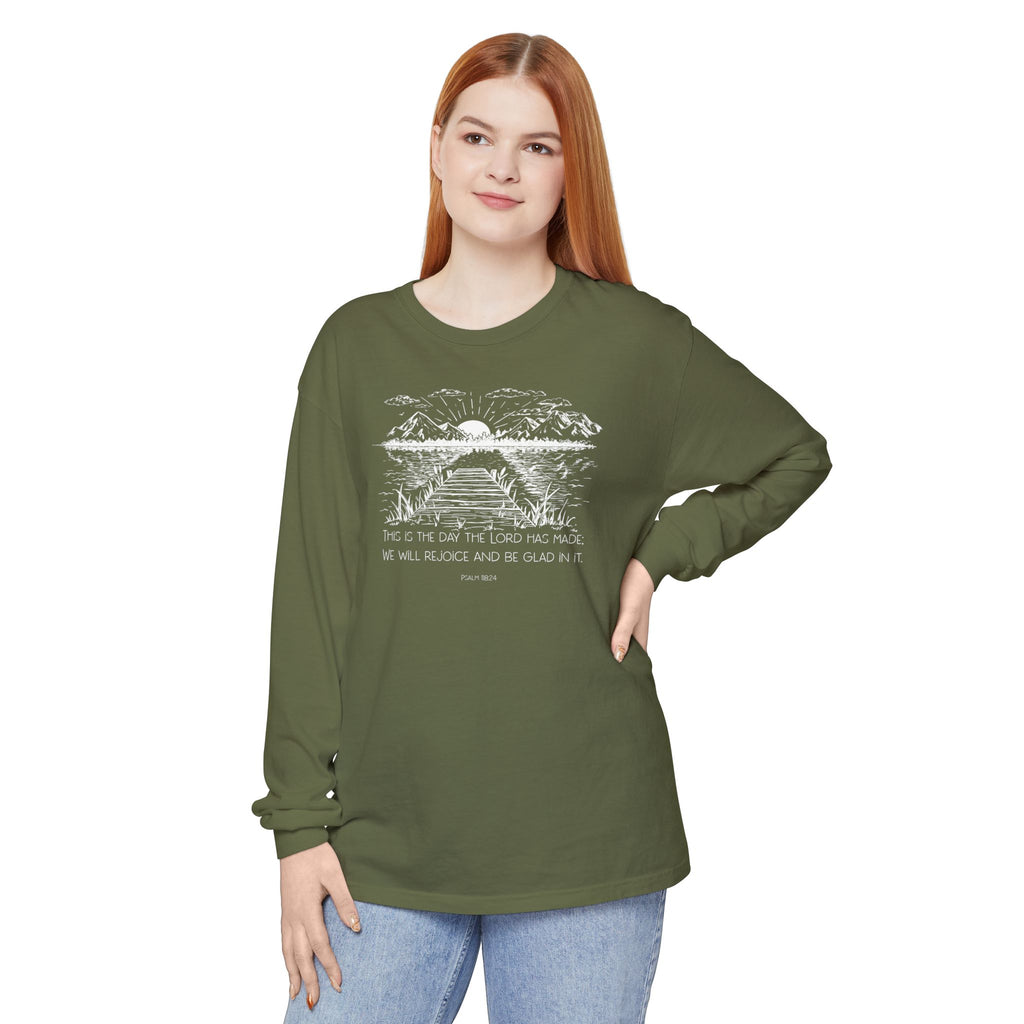 Woman wearing a long-sleeve Hemp Comfort Colors t-shirt with nature graphic and Psalm 118:24