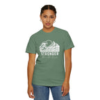Person wearing Stronger Than The Storm faith t-shirt in light green