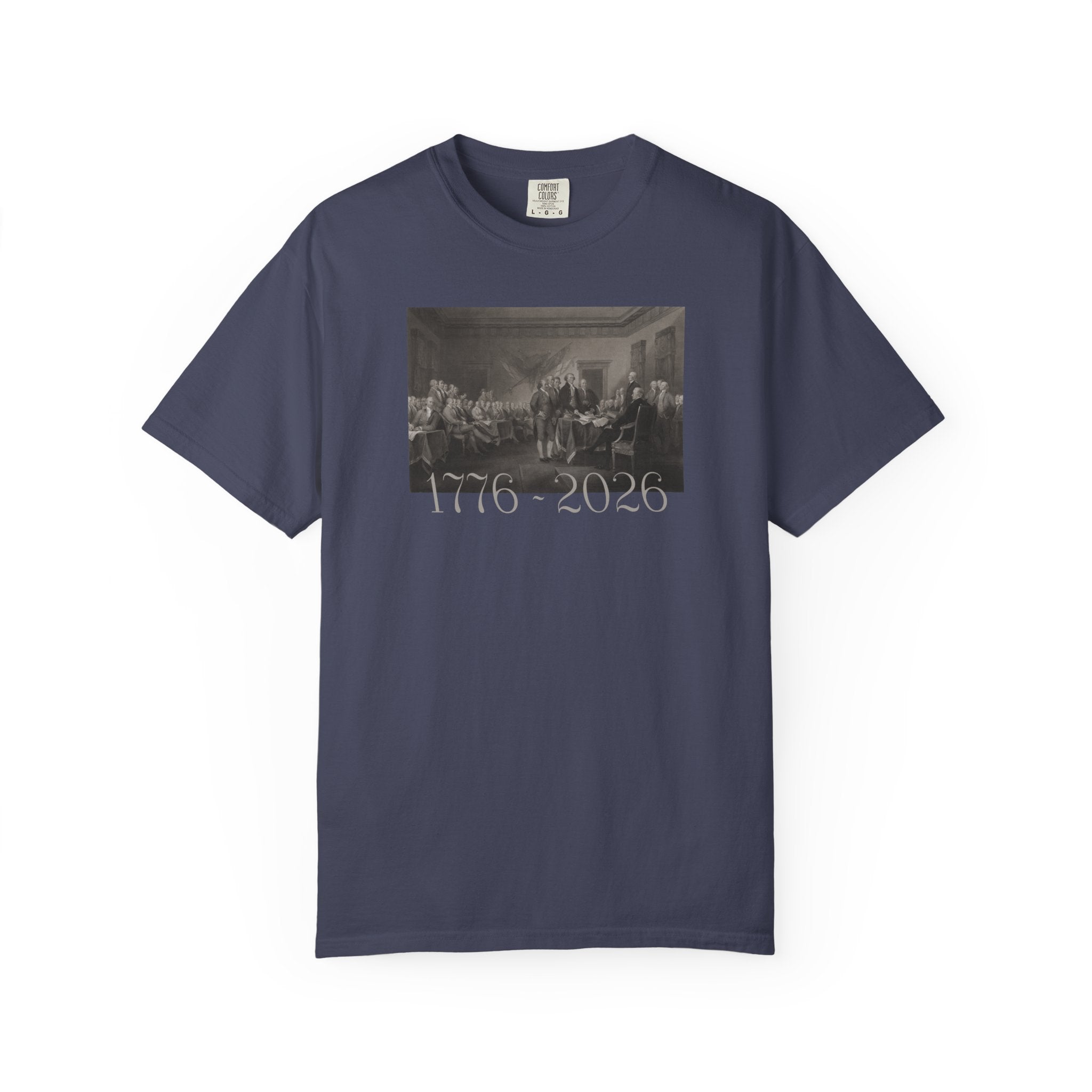 Denim Comfort Colors t-shirt with a printed design of Trumbull's  'Declaration of Independence' painting with '1776-2026' in overlapping revolutionary era text