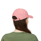 Back view of a woman wearing a pink cap 