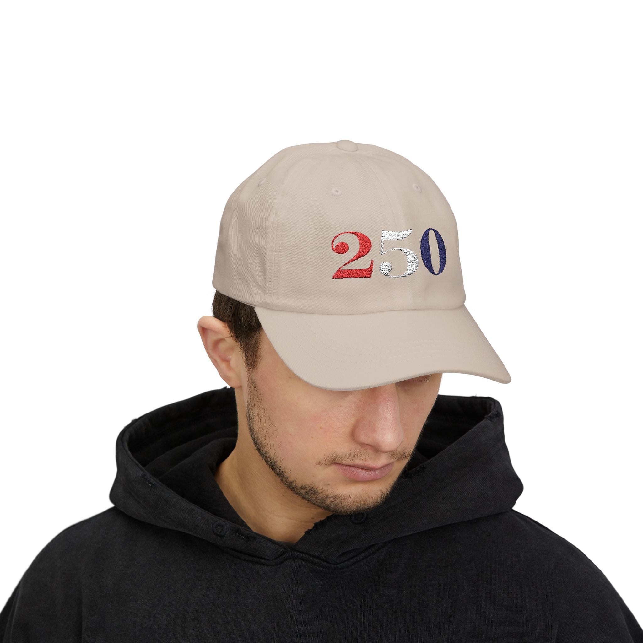 Male model wearing embroidered America 250 bold embroidered dad cap in stone