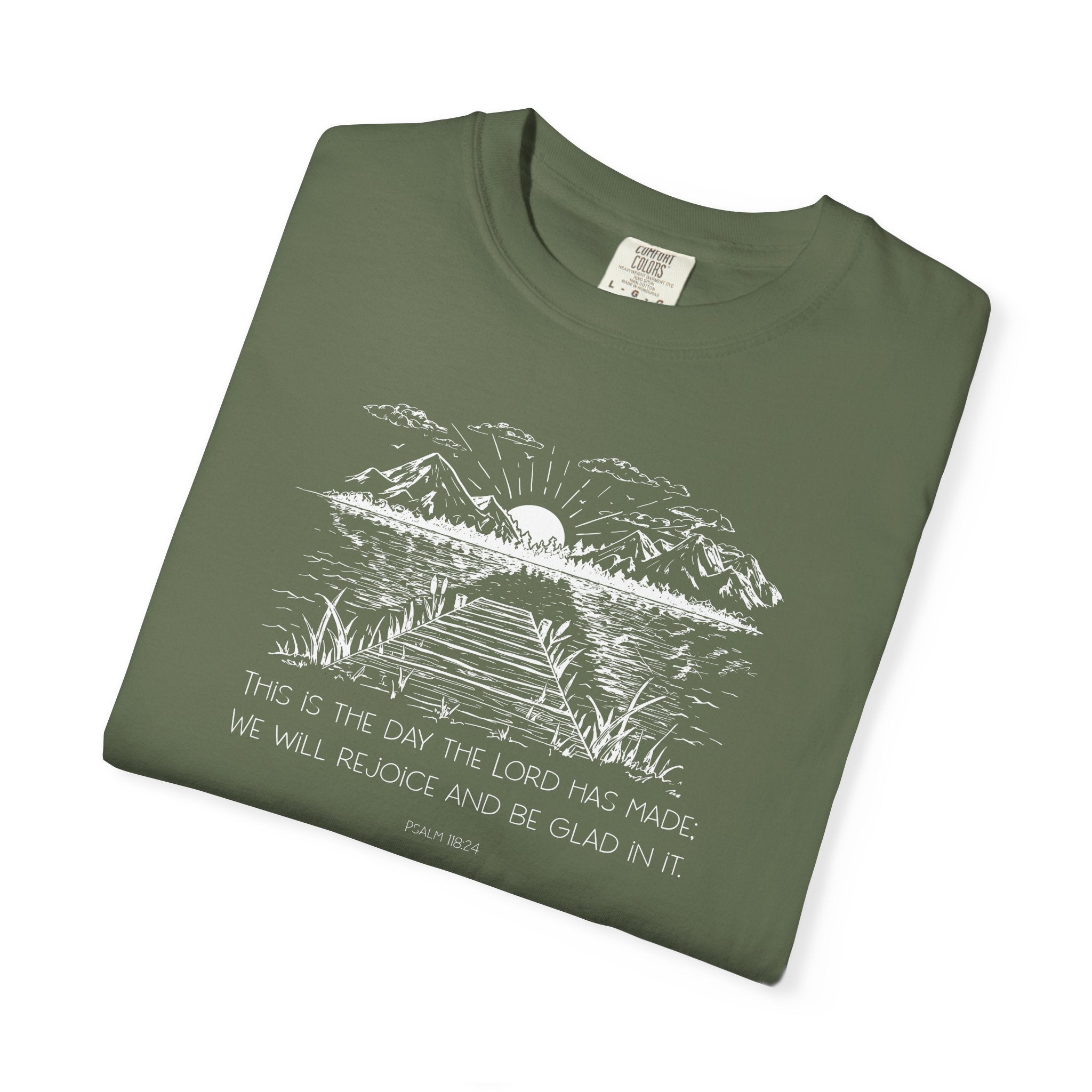 Folded Sage Comfort Colors t-shirt with nature graphic and Psalm 118:24 beneath it