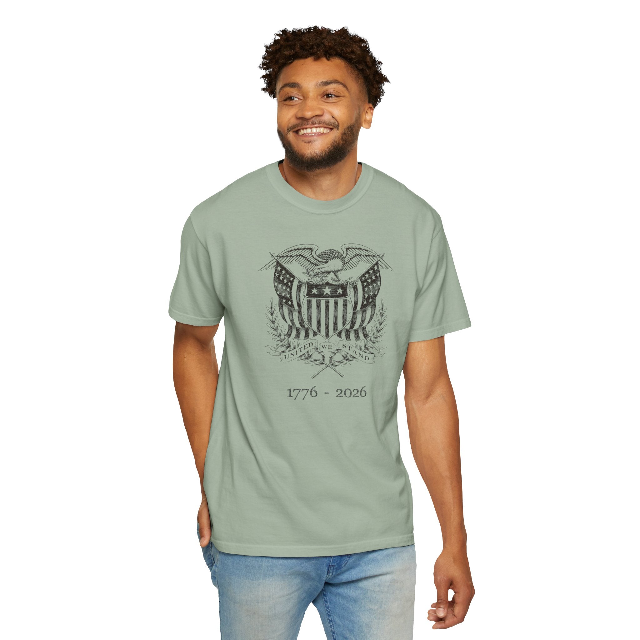 Smiling man wearing a bay United We Stand eagle t-shirt