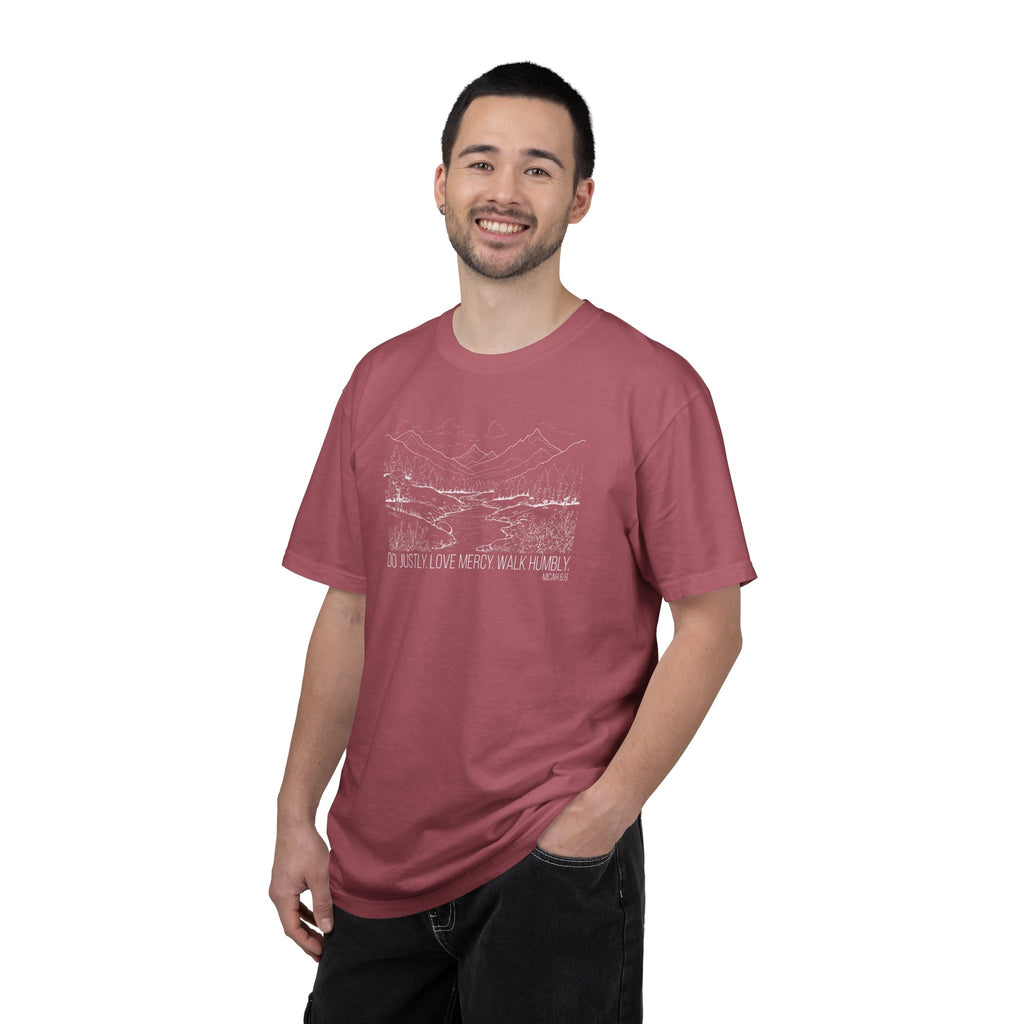 Smiling man wearing Micah 6:8 Christian t-shirt in crimson