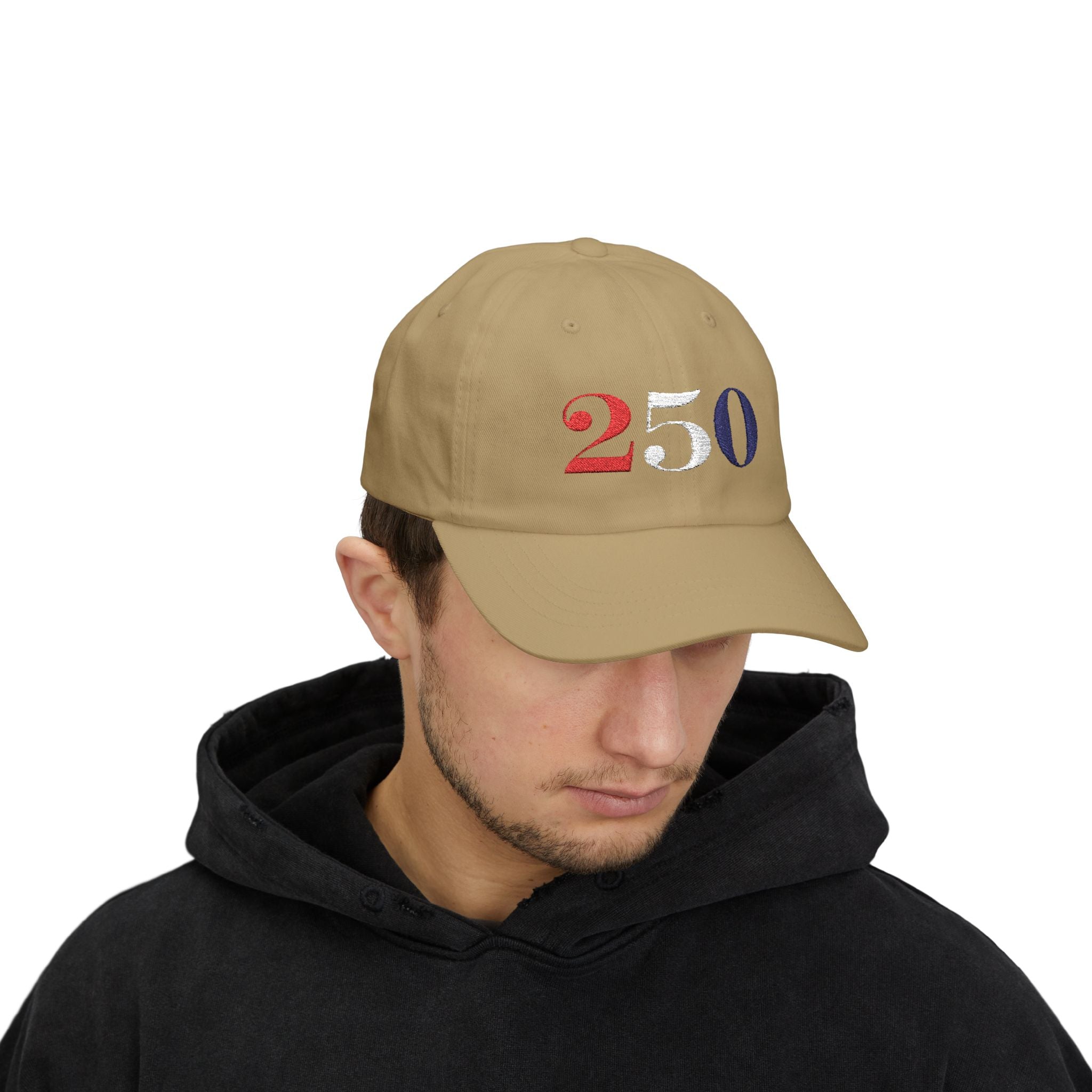 Male model wearing embroidered America 250 bold embroidered dad cap in khaki