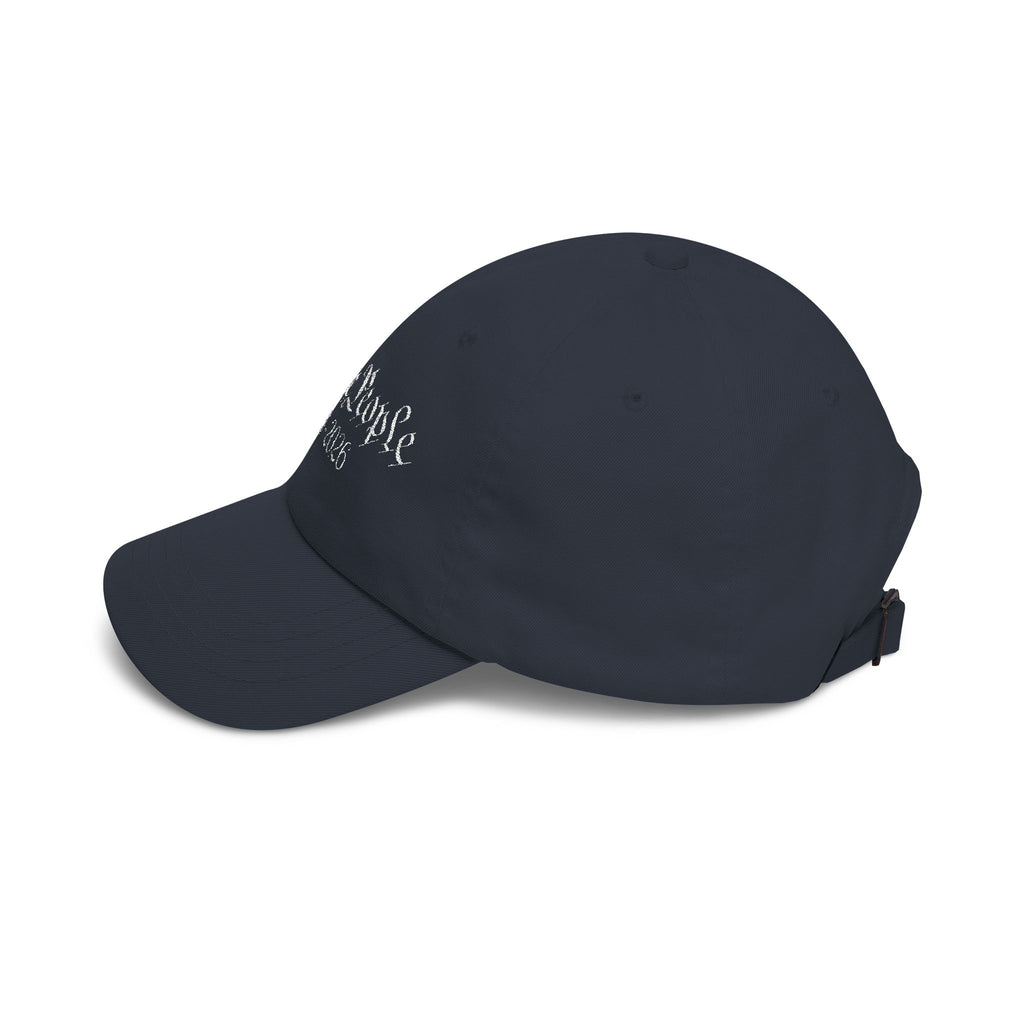 Side view of a navy blue cap 